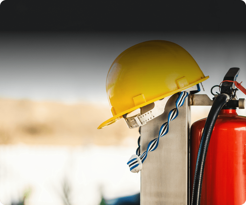 Yellow hard hat and fire extinguisher